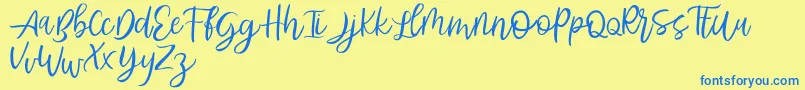Abhyaksa FREE Font – Blue Fonts on Yellow Background
