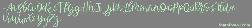 Abhyaksa FREE Font – Green Fonts on Gray Background