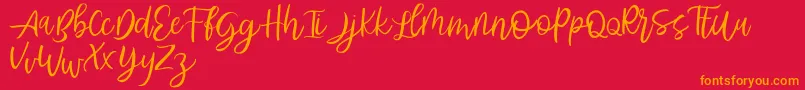 Abhyaksa FREE-Schriftart – Orangefarbene Schriften auf rotem Hintergrund