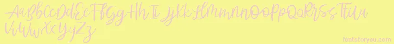 Abhyaksa FREE-Schriftart – Rosa Schriften auf gelbem Hintergrund