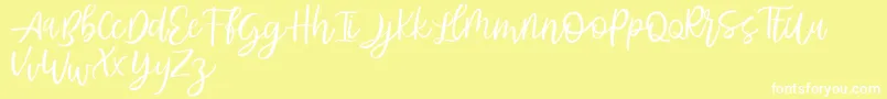 Abhyaksa FREE Font – White Fonts on Yellow Background