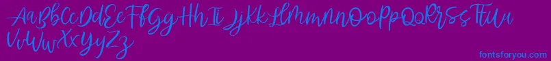 Abhyaksa FREE Font – Blue Fonts on Purple Background