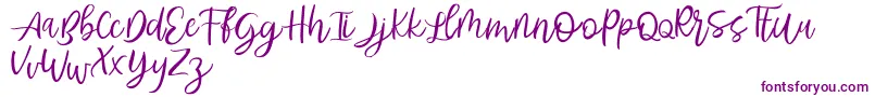 Abhyaksa FREE-Schriftart – Violette Schriften auf weißem Hintergrund