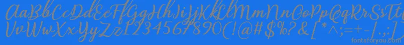 Abilya Regular Font by 7NTypes-fontti – harmaat kirjasimet sinisellä taustalla