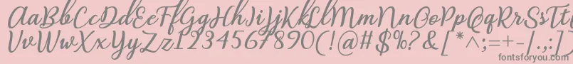 Czcionka Abilya Regular Font by 7NTypes – szare czcionki na różowym tle