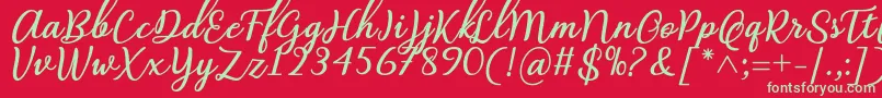 Czcionka Abilya Regular Font by 7NTypes – zielone czcionki na czerwonym tle