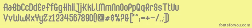 Шрифт Abingdon Bold – серые шрифты на жёлтом фоне