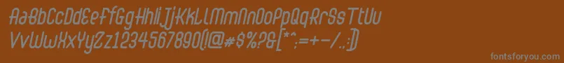 Czcionka Abingdon Italic – szare czcionki na brązowym tle