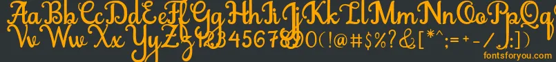 Abiyells Font – Orange Fonts on Black Background