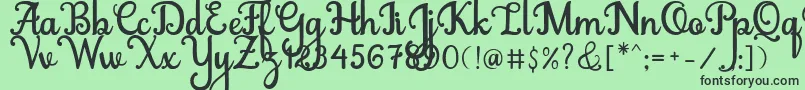 Abiyells Font – Black Fonts on Green Background