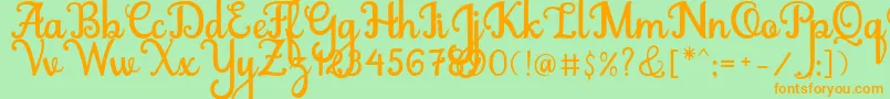 Abiyells Font – Orange Fonts on Green Background
