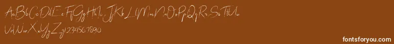 abrakadabra-Schriftart – Weiße Schriften auf braunem Hintergrund