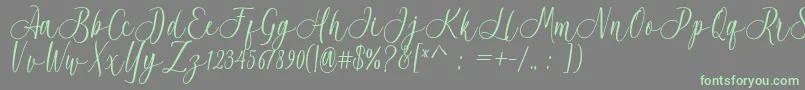 Acrobad-Schriftart – Grüne Schriften auf grauem Hintergrund