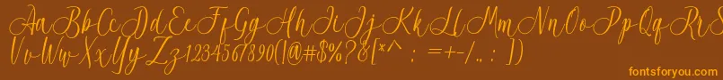 Acrobad Font – Orange Fonts on Brown Background