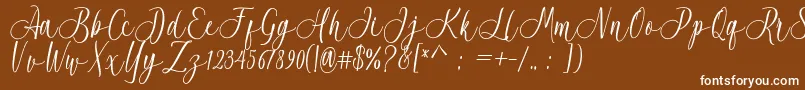 Acrobad-fontti – valkoiset fontit ruskealla taustalla