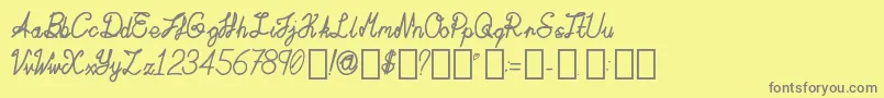 ActaAmour Regular-Schriftart – Graue Schriften auf gelbem Hintergrund