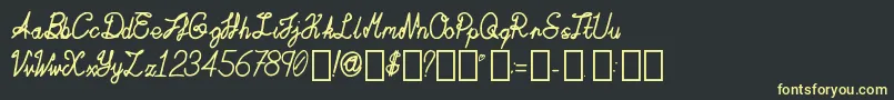 ActaAmour Regular Font – Yellow Fonts on Black Background