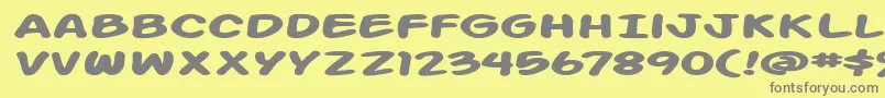 フォントAction Man Extended Bold – 黄色の背景に灰色の文字
