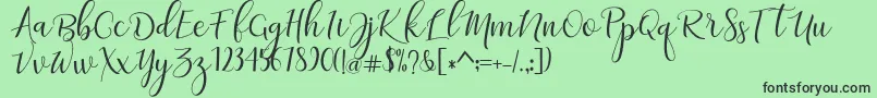 フォントadaline script   regular – 緑の背景に黒い文字