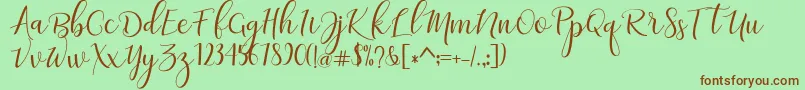 フォントadaline script   regular – 緑の背景に茶色のフォント