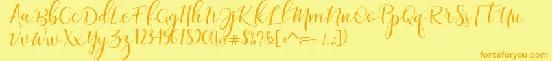 フォントadaline script   regular – オレンジの文字が黄色の背景にあります。