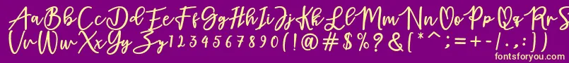 フォントadamd – 紫の背景に黄色のフォント