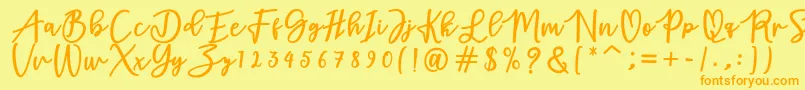 adamd Font – Orange Fonts on Yellow Background