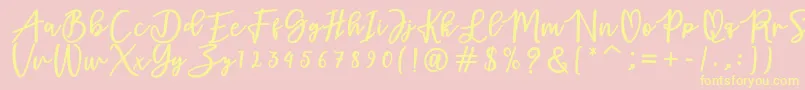 adamd Font – Yellow Fonts on Pink Background