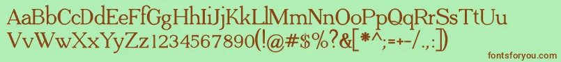 フォントADega Serif Bold – 緑の背景に茶色のフォント