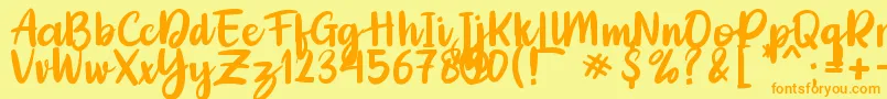 Adelica Brush Font – Orange Fonts on Yellow Background