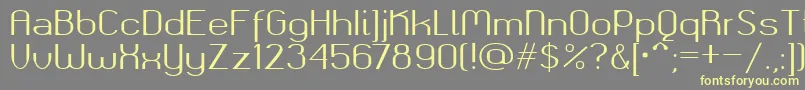 フォントOkolaksregular – 黄色のフォント、灰色の背景