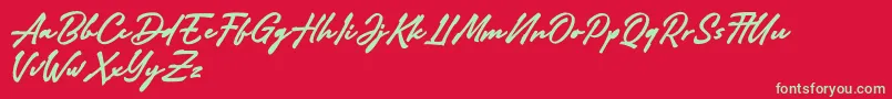 Adelina Camarie Font – Green Fonts on Red Background