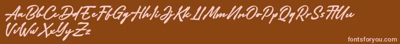 Adelina Camarie Font – Pink Fonts on Brown Background