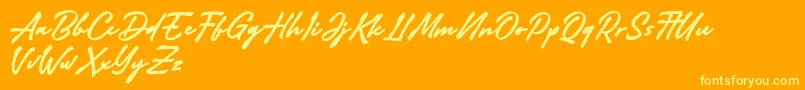 Adelina Camarie-fontti – keltaiset fontit oranssilla taustalla