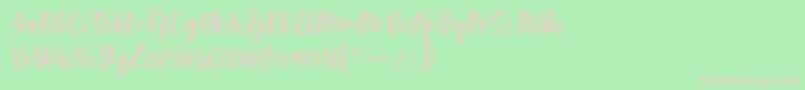 Adelio Darmanto Font by Keithzo 7NTypes-fontti – vaaleanpunaiset fontit vihreällä taustalla