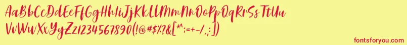 Adelio Darmanto Font by Keithzo 7NTypes-fontti – punaiset fontit keltaisella taustalla