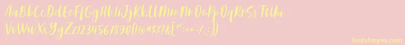 Adelio Darmanto Font by Keithzo 7NTypes-Schriftart – Gelbe Schriften auf rosa Hintergrund