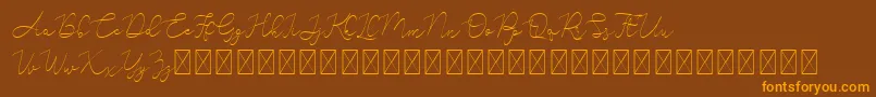 Шрифт Adelya – оранжевые шрифты на коричневом фоне