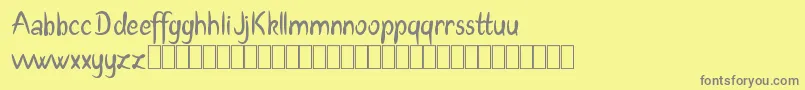 Adetar Demo Font – Gray Fonts on Yellow Background