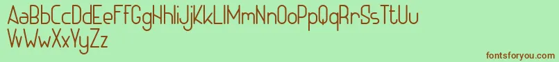 ADHE SANS Light FREE Font – Brown Fonts on Green Background