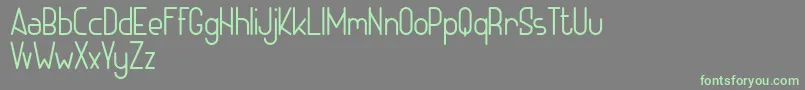 ADHE SANS Light FREE Font – Green Fonts on Gray Background