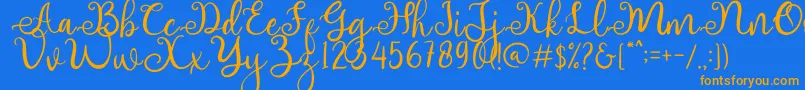 adhellita-Schriftart – Orangefarbene Schriften auf blauem Hintergrund