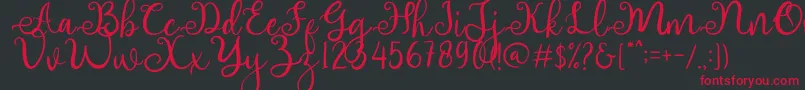 adhellita Font – Red Fonts on Black Background