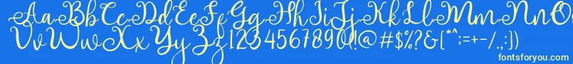 adhellita Font – Yellow Fonts on Blue Background