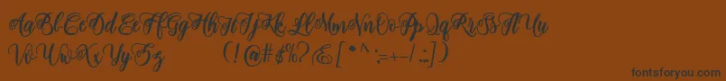 fuente adinda script – Fuentes Negras Sobre Fondo Marrón