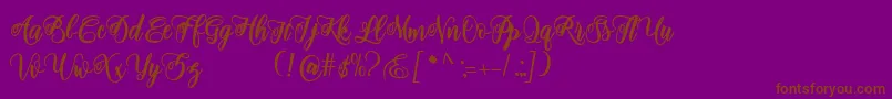 Fonte adinda script – fontes marrons em um fundo roxo