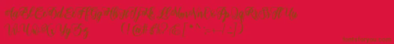 adinda script Font – Brown Fonts on Red Background
