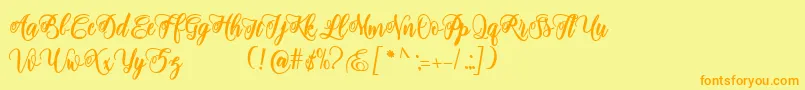 Шрифт adinda script – оранжевые шрифты на жёлтом фоне