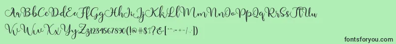 Adinda Font – Black Fonts on Green Background