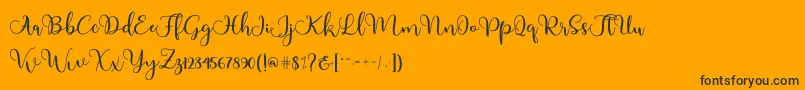 Adinda-Schriftart – Schwarze Schriften auf orangefarbenem Hintergrund